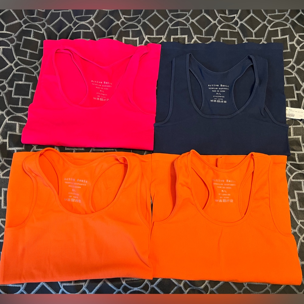 1 NWT!!! and 3 NWOT!!! 4 Active Basic Rib Seamless Racerback Tank tops.